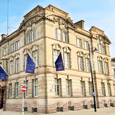 The Commissioners Building on St. Thomas Street, home of the salon.